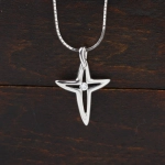 Colgante cruz con brillante