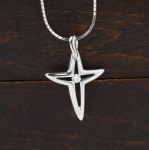 Colgante cruz con brillante
