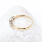 Anillo media alianza de 7 diamantes en oro amarillo de 18K – 0,35 ct